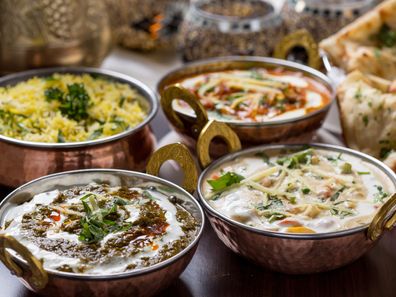 Bowls with freshly prepared Indian food.
